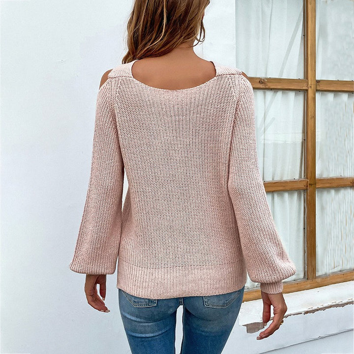 Trendy women's sweater with an off-shoulder design and a playful slit Lune London