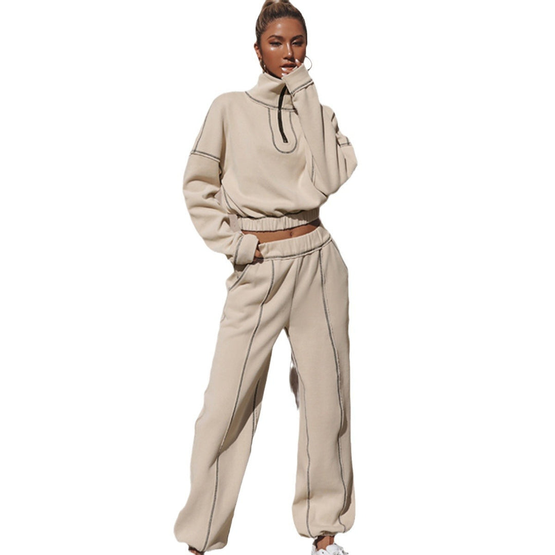Sporty zip sweater for ladies with ruffled hem and loose fit Lune London