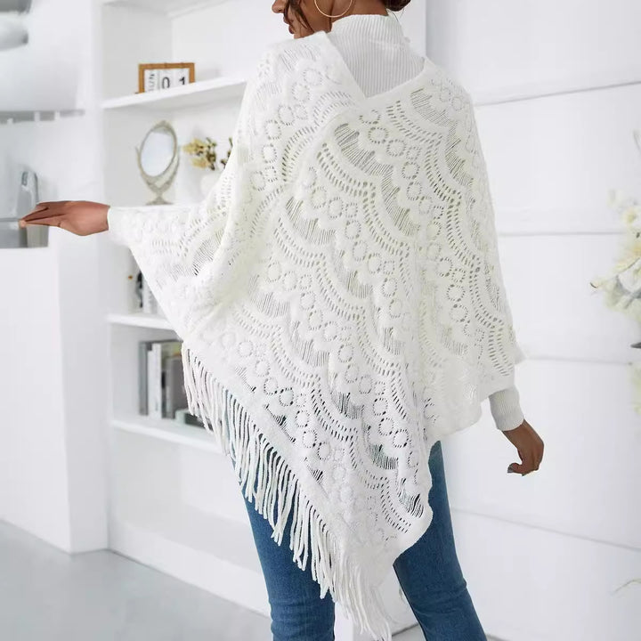 Ladies' knitted poncho with artistic crochet patterns and fringes Lune London