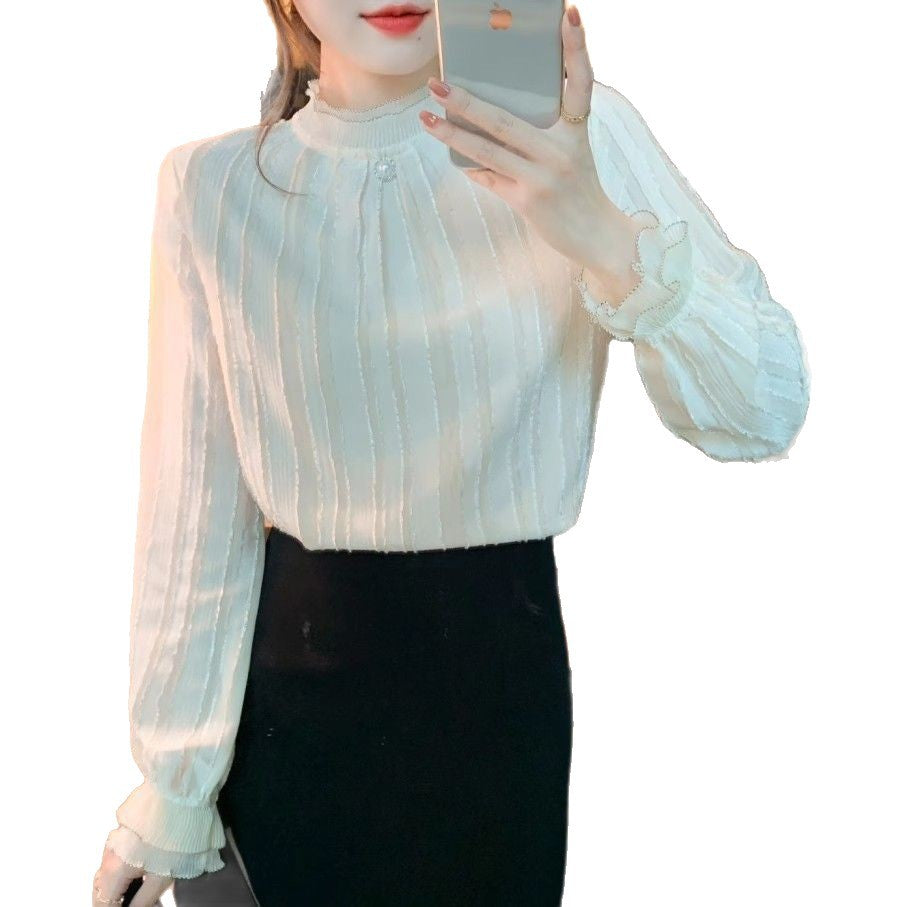 Blouse élégante pour femmes avec design texturé et ourlet volé Chic & Stil