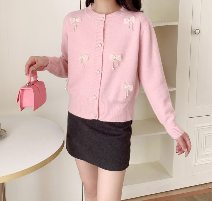 Knitted jacket for women with lace embellishments and button details Lune London