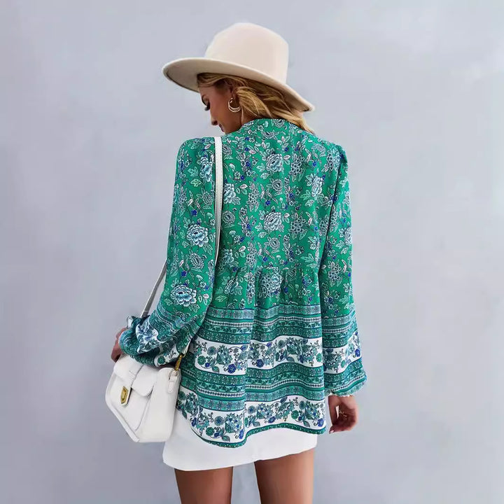 Woman blouse with colorful floral pattern and puff sleeves Lune London