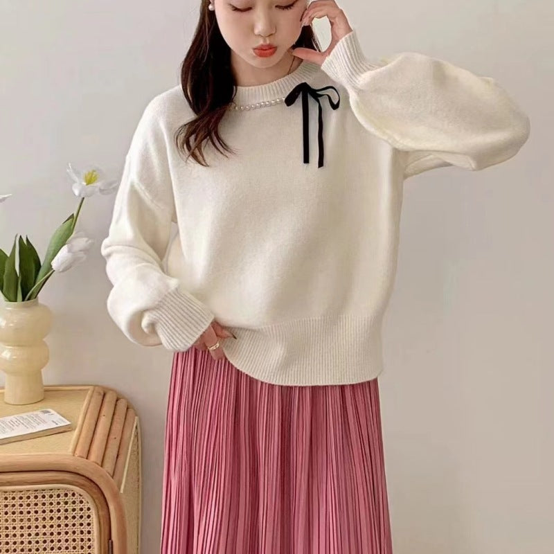 Ladies' fashion sweater with decorative band and pearl details Lune London