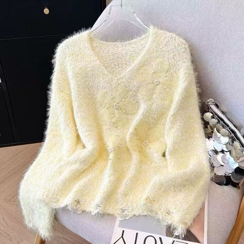 Pull côtelé pour femmes avec appliqués floraux Chic & Stil