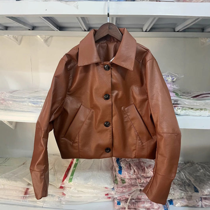 Women's faux leather jacket with modern button details Lune London