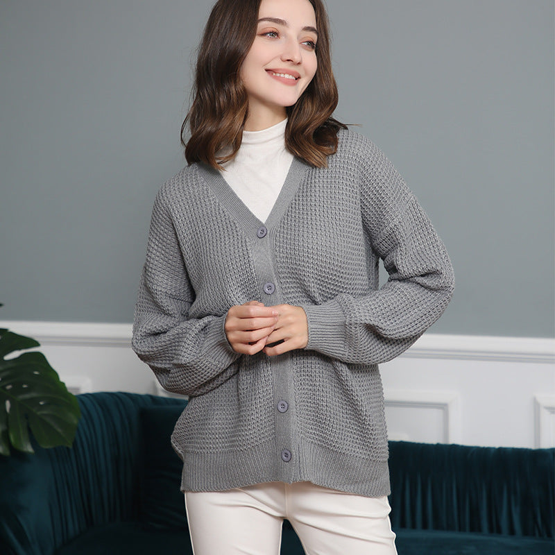 Women's knitted jacket with structured pattern and practical button details Lune London