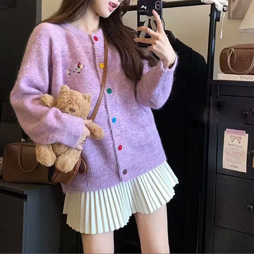 Knitted jacket for women with colored buttons and an embroidered pattern Lune London