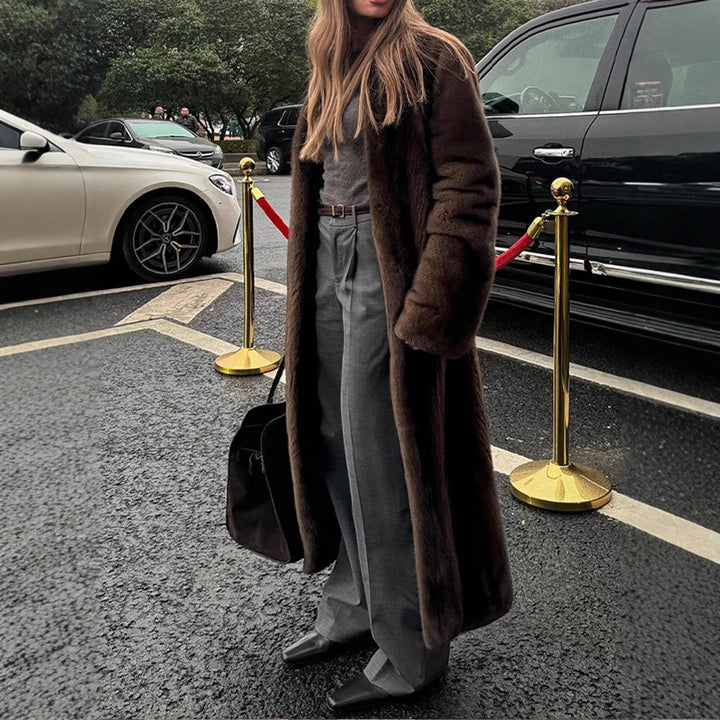 Ladies elegant and fluffy long faux fur coat Lune London