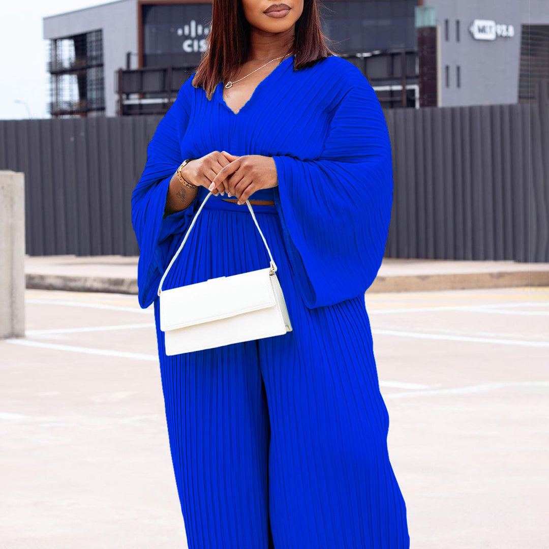 Puffed sleeve pleated jumpsuit for women with a fitted silhouette Lune London