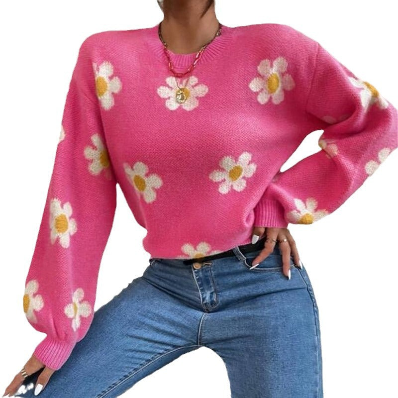 Knit sweater for women with a playful floral pattern and elegant puff sleeves Lune London