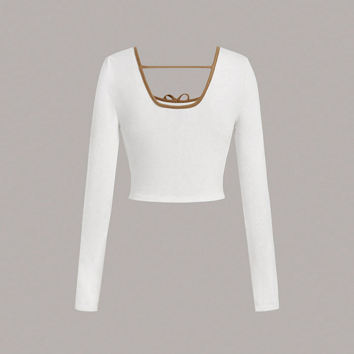 Long sleeve cropped top for women with an elegant square neckline and sophisticated knot details Chic & Stil