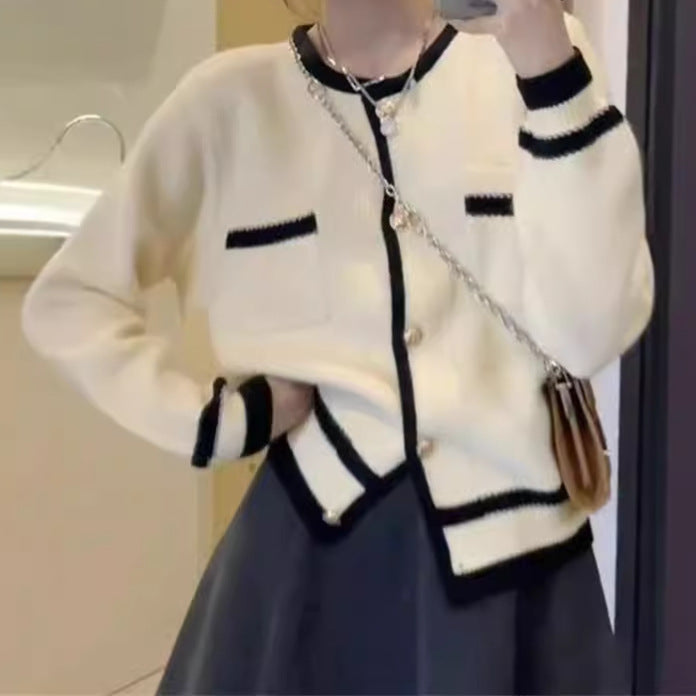 Elegant knitted jacket for women with decorative pockets and contrasting details Lune London