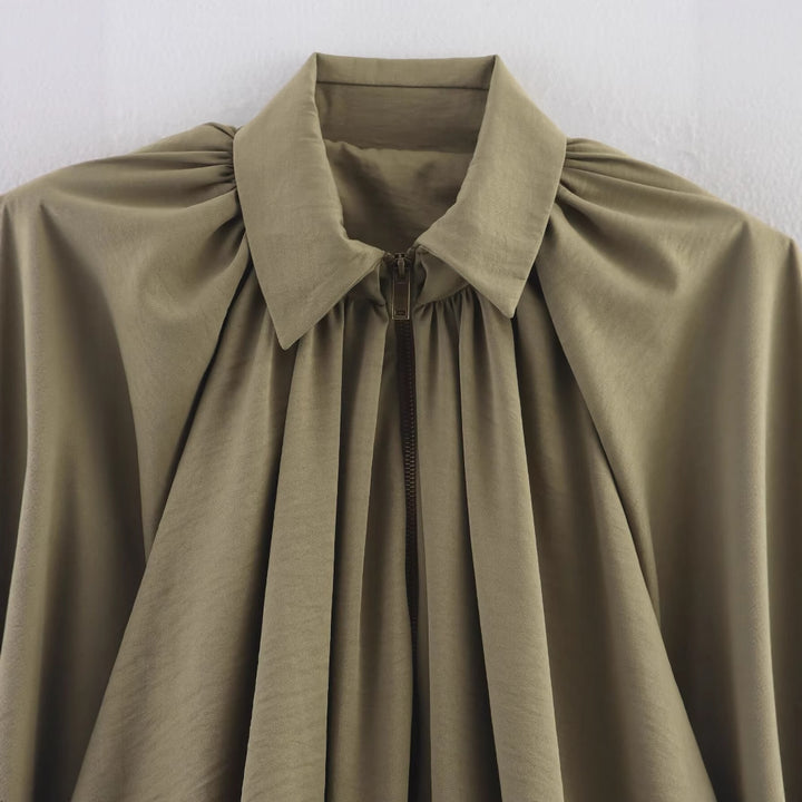 Oversized blouse for women with refined draping and an elegant button detail Lune London
