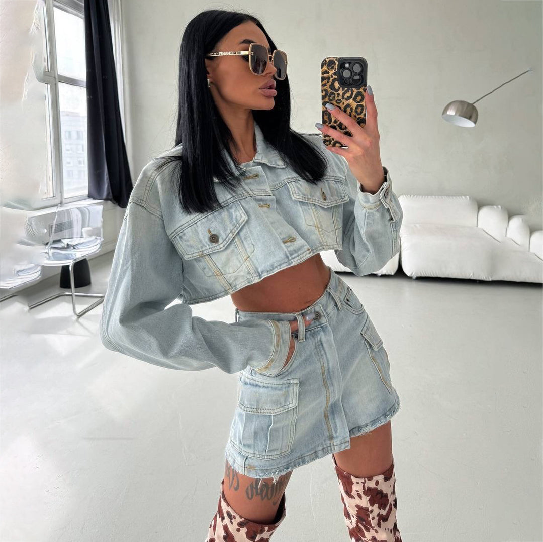 Women's cropped denim jacket with matching mini skirt in a modern utilitarian style Lune London