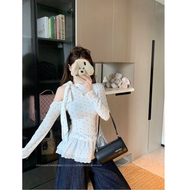 Women's asymmetric top with playful ruffle detail Chic & Stil