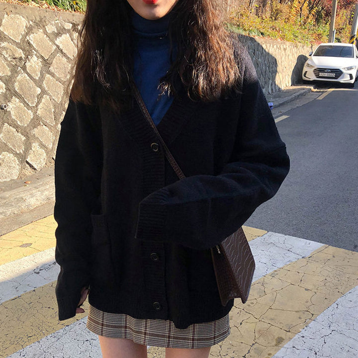 Cardigan confortable pour femmes avec une coupe décontractée et des épaules basses Chic & Stil