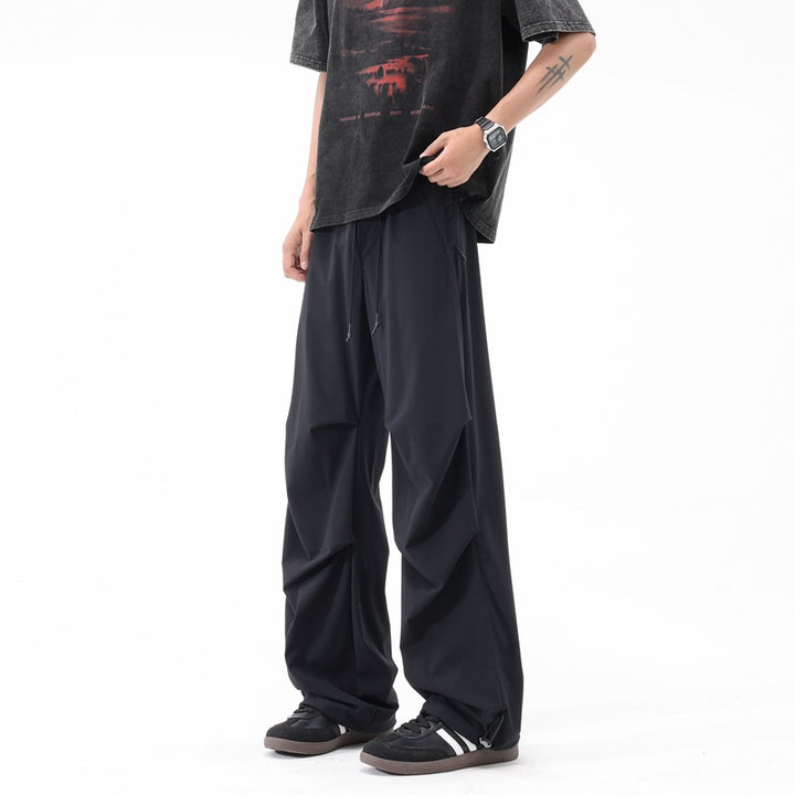 Loose sports pants for men with a remarkable draped design Lune London