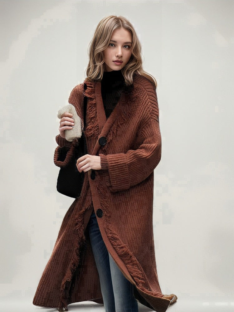 Ladies chunky knitted cardigan with fringed details and an open cut Lune London