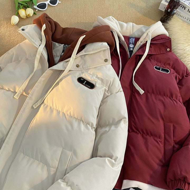 Ladies stylish quilted jacket with integrated hoodie Lune London