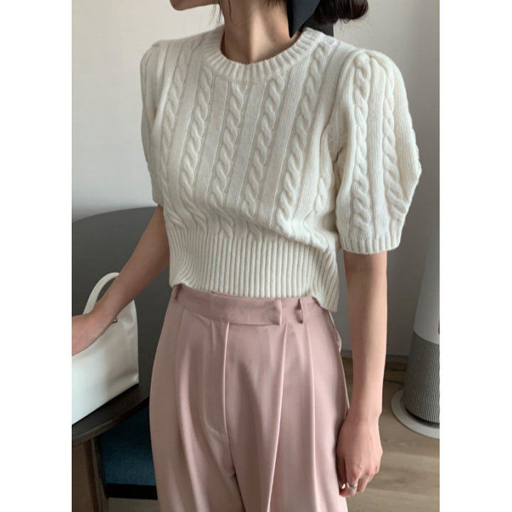 Knitted sweater for women with voluminous sleeves and cable knit pattern Lune London