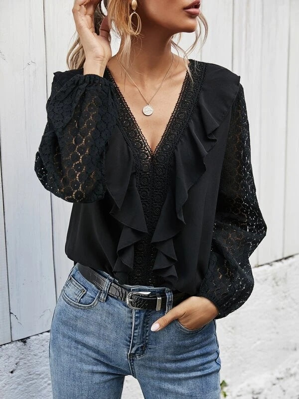 Ruffled blouse for women with transparent sleeves and delicate lace accents Lune London