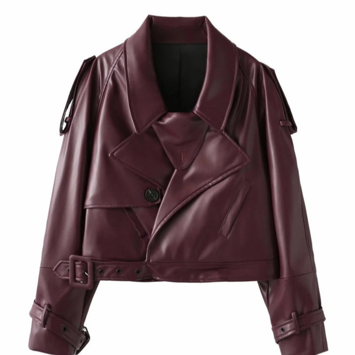 Faux leather biker jacket for women with a trendy cropped design, adjustable belt, and decorative buttons Lune London