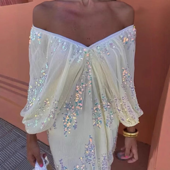 Maxi dress for women with voluminous puff sleeves and a floral rhinestone design Lune London