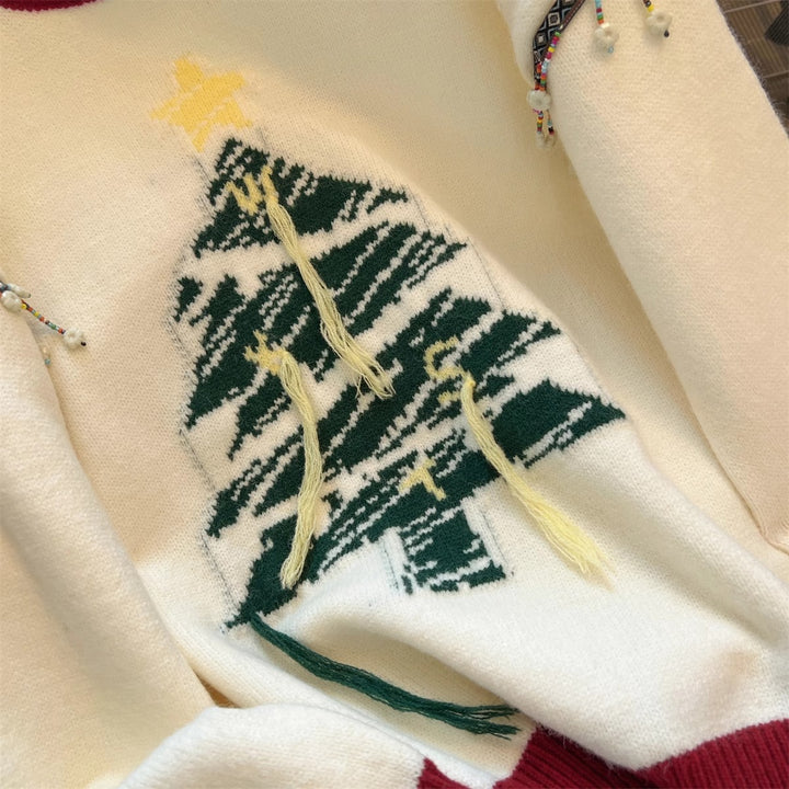 Elegant knitted sweater for women with Christmas tree pattern and playful accents Lune London