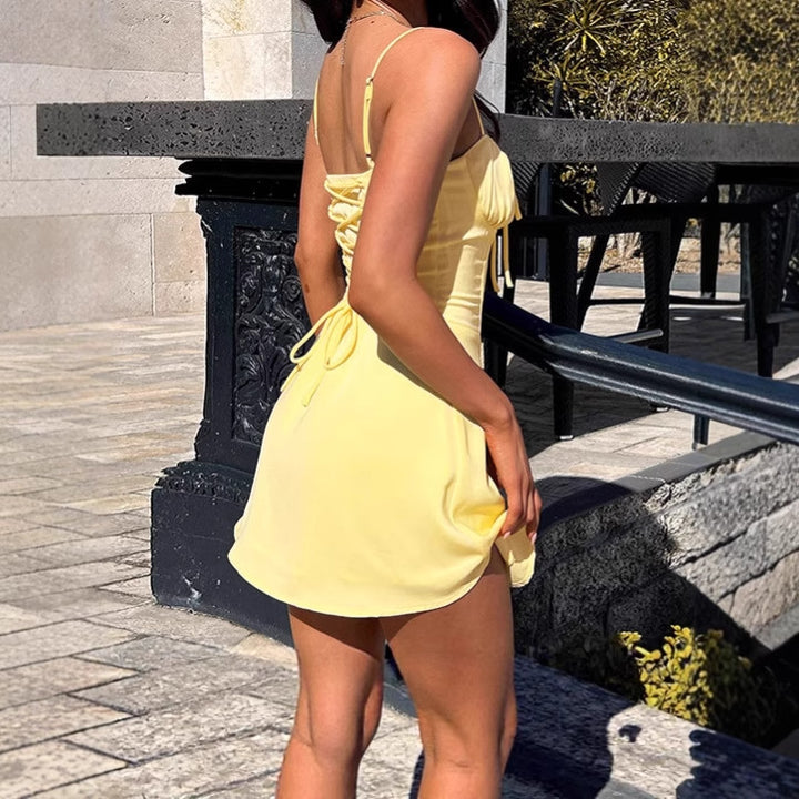 Lune London mini dress for women with adjustable straps and ruffle details