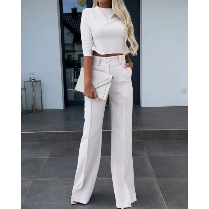 Woman trendy cropped top with elegant palazzo pants Lune London