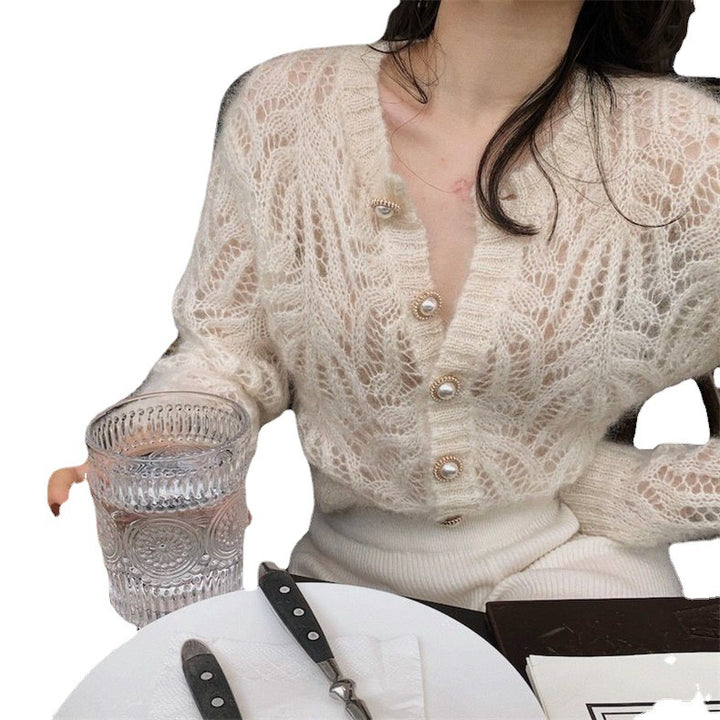 Gilet pour femmes avec un motif en dentelle complexe et des boutons en perles Chic & Stil