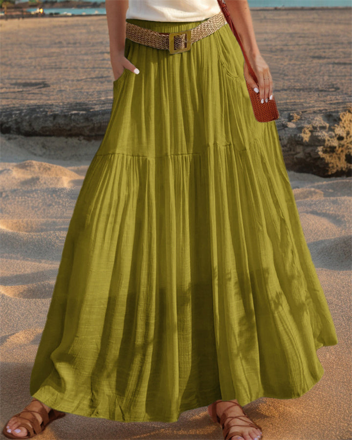 Maxi flared skirt for women with elegant pleated draping and practical pockets Lune London