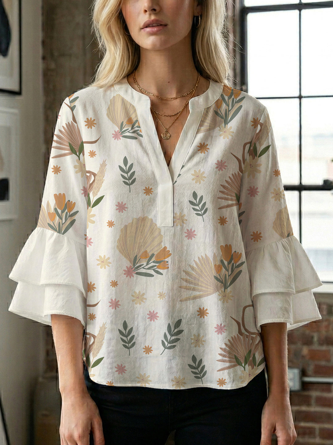 Women's blouse with ruffle details and eye-catching animal print Lune London
