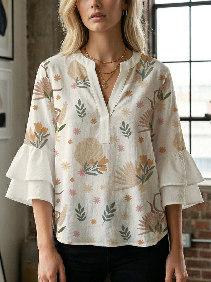 Women's blouse with ruffle details and eye-catching animal print Lune London