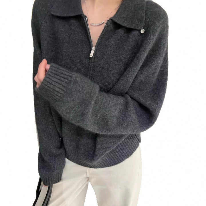 Pull femme avec zip latéral et col élégant Chic & Stil