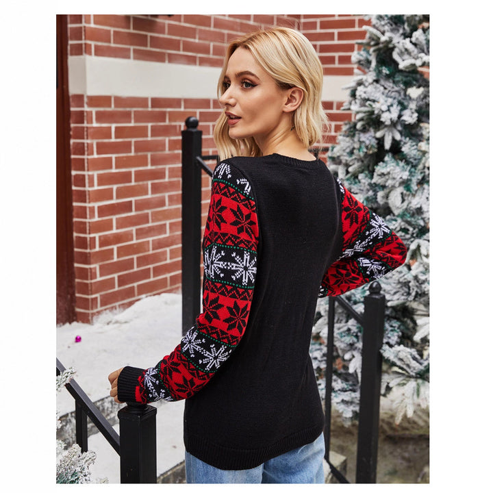 Women's Christmas sweater with festive Santa pattern and chic shiny details
