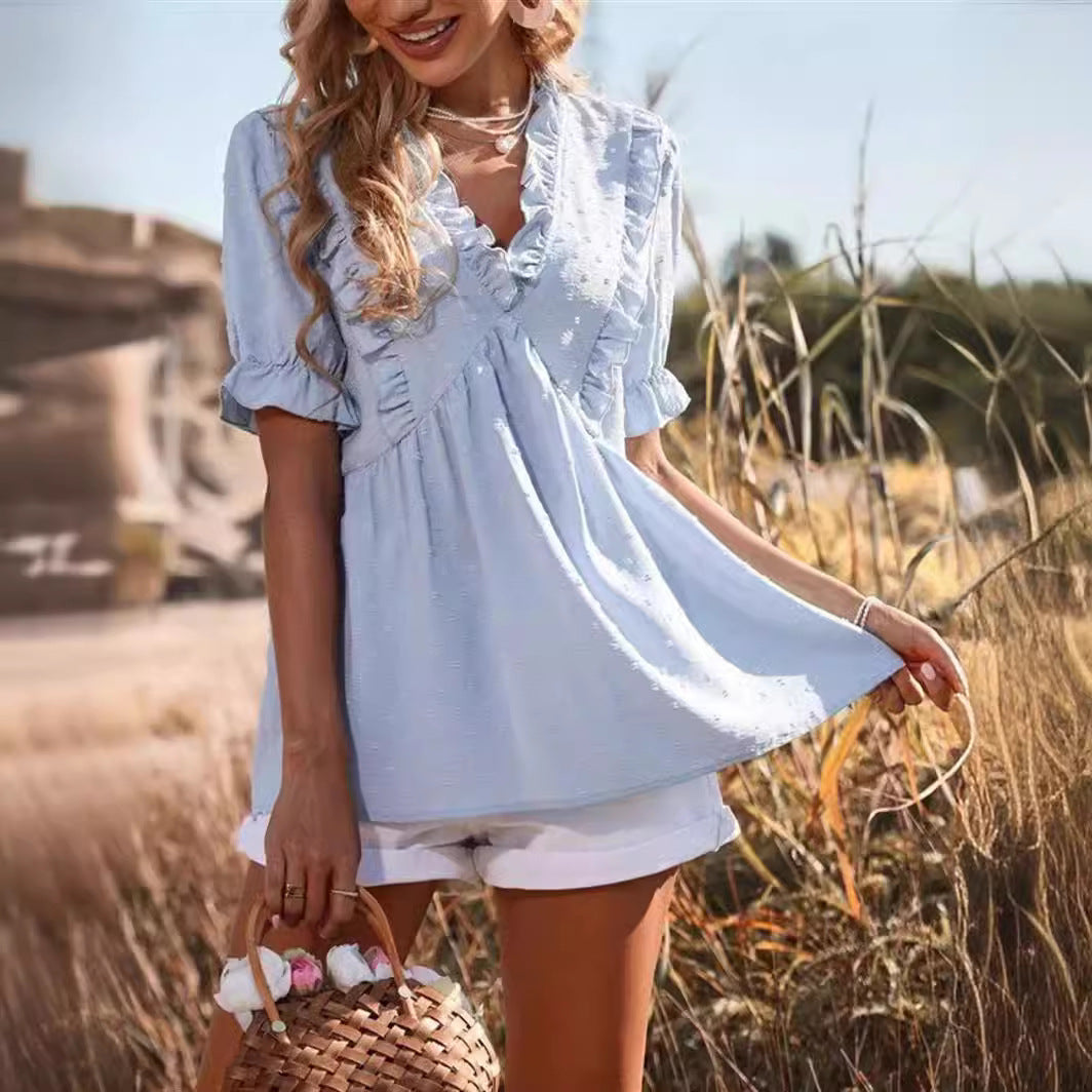Elegant summer top for women with ruffle details and chic V-neck style