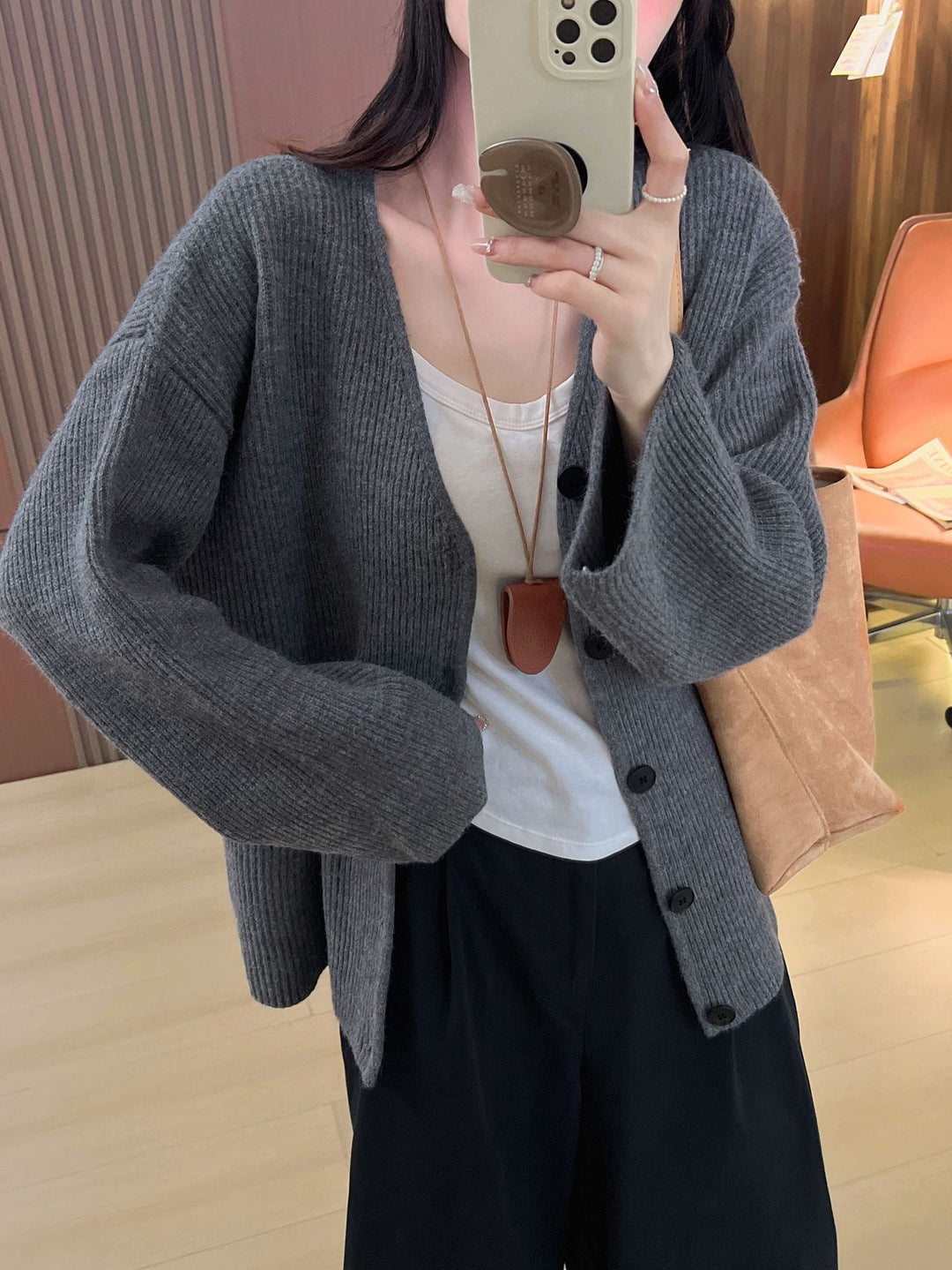 Ladies chunky knit cardigan with spacious pockets and deep V-neck Lune London