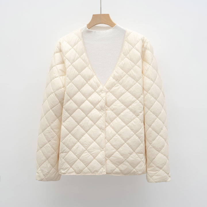 Quilted transitional jacket for women with modern V-neck and button closure Lune London
