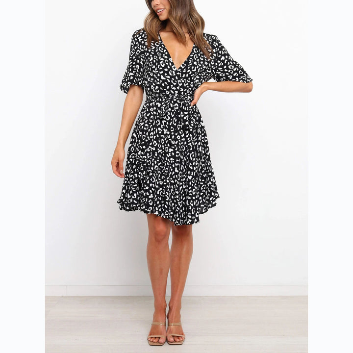 Women's wrap dress with generous ruffle sleeves and beautiful animal print Lune London