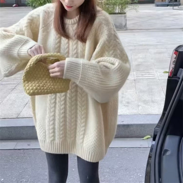Chunky knit sweater for women with trendy cable patterns and dropped shoulders Lune London