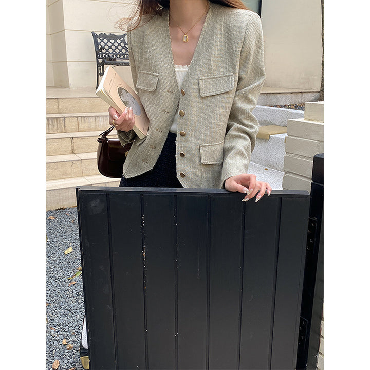 Women's fashionable jacket with textured design and double button placket Chic & Stil
