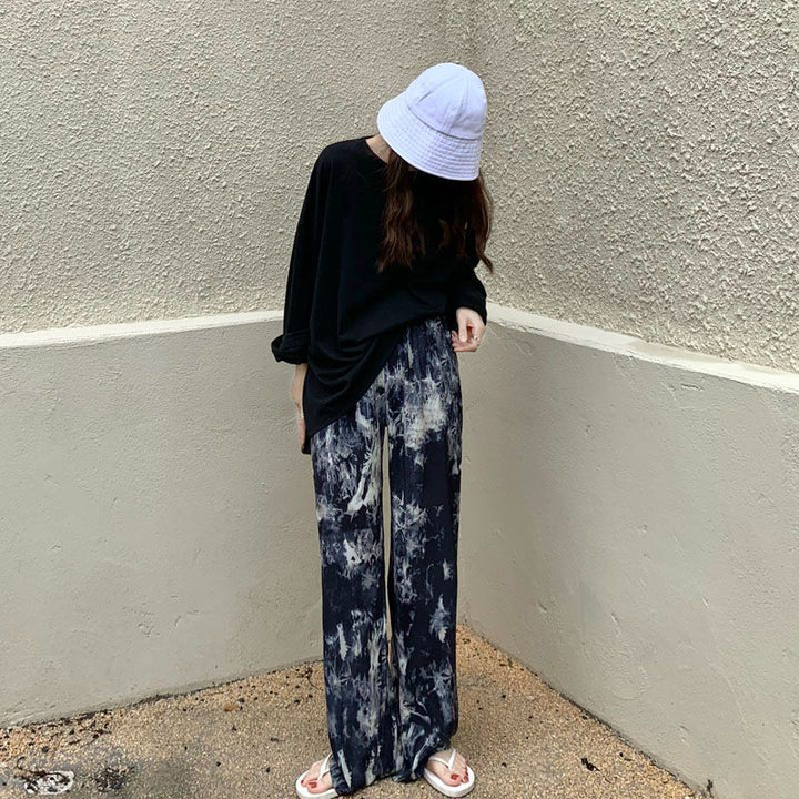 Women’s casual jersey pants with a low waist and trendy tie-dye design