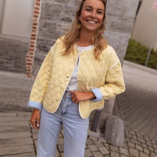 Women's quilted transition jacket with round collar and practical pockets Lune London