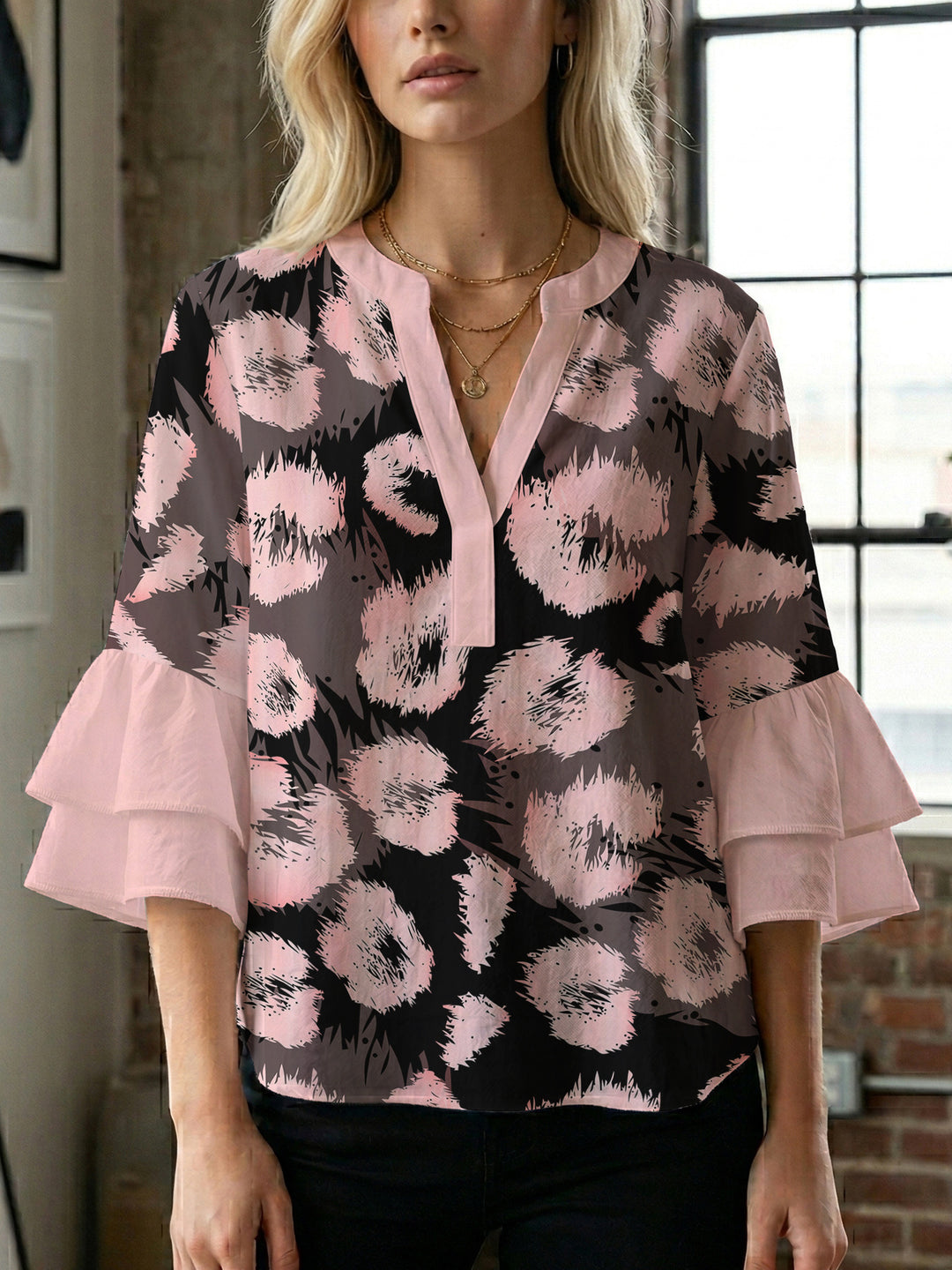 Women's blouse with ruffle details and eye-catching animal print Lune London