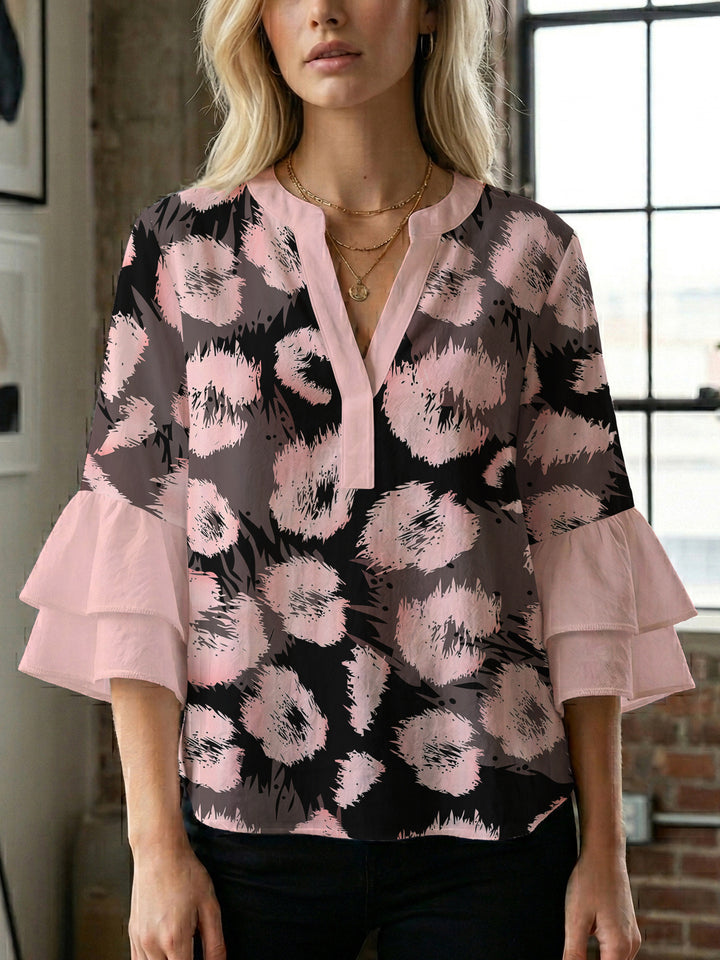 Women's blouse with ruffle details and eye-catching animal print Lune London