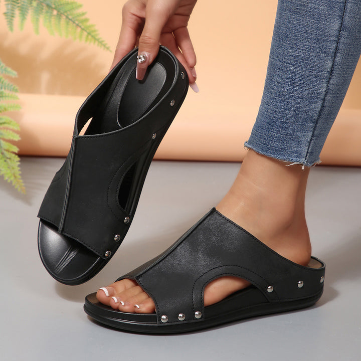 Comfortable slip-on sandals for ladies with a trendy cut-out design and an elegant rhinestone pattern Lune London