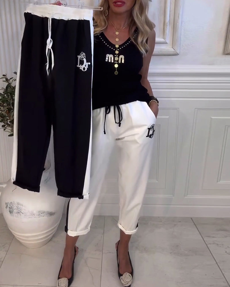 Pantalons de loisirs pour femmes avec design contrastant tendance et taille élastique Chic & Stil