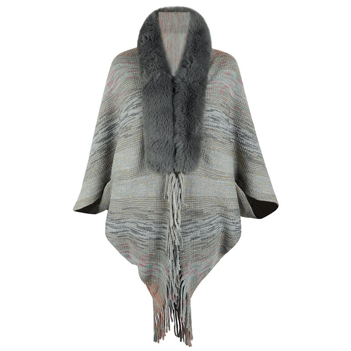 Elegant poncho for ladies with luxurious faux fur collar and fringed hem Lune London