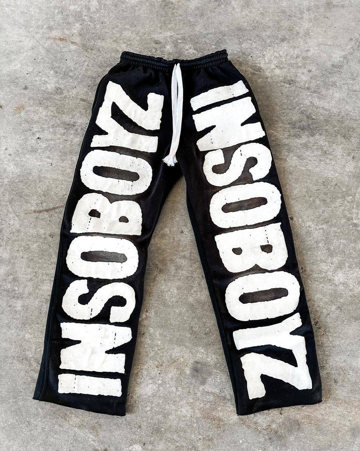 Women's casual pants with trendy statement print Chic & Stil